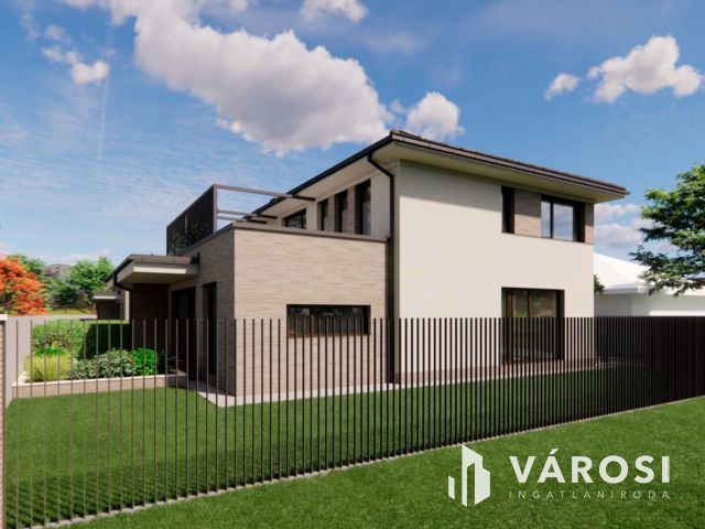 Debrecen kedvelt, csendes kertvárosi részén ELADÓ IKERHÁZ